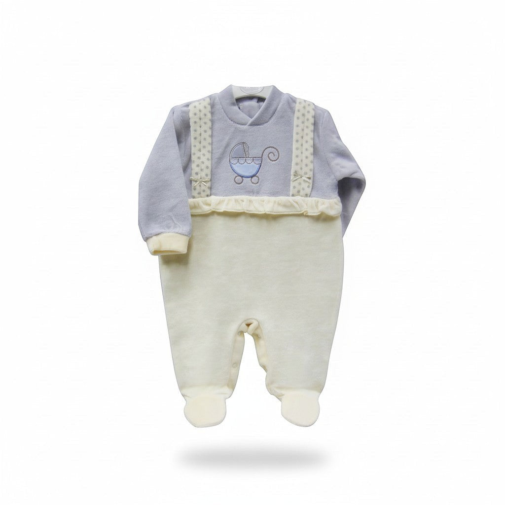 Baby outfit with light blue top and cream pants on a white background