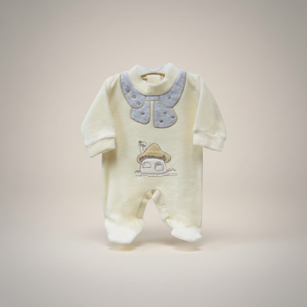 Baby onesie with a cartoon design on a beige background