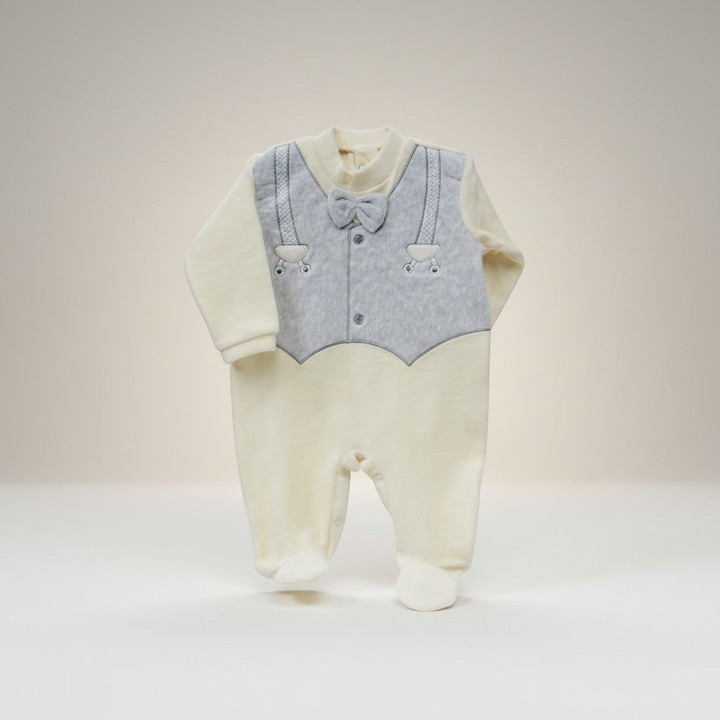 Baby outfit with white shirt, gray vest, and suspenders on a light gray background