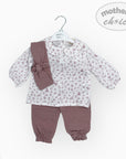Baby outfit with floral top, bloomers, and headband on a hanger with 'mother's choice' branding.