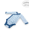 Baby bodysuit with blue whale pattern on a white background, featuring 'Mother's Choice' brand.