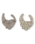 Two baby bibs, one gray and one with a pattern, on a white background