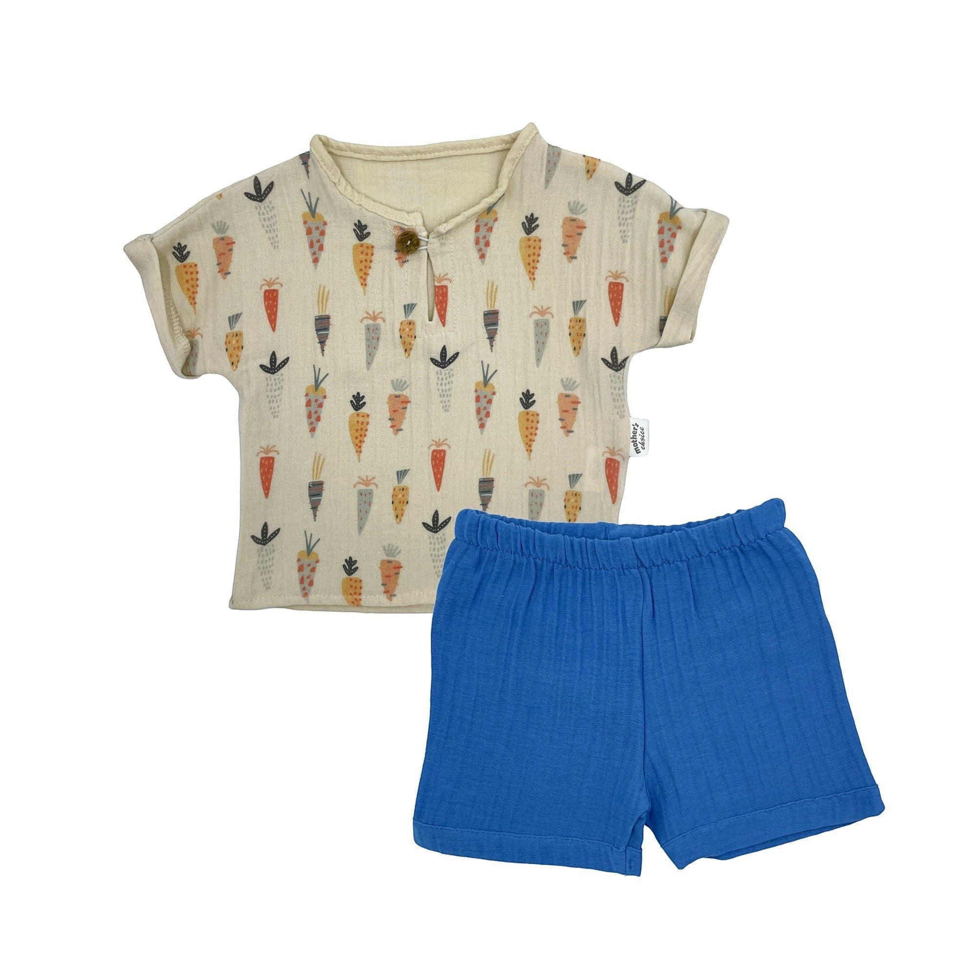 Children's outfit with patterned shirt and blue shorts on a white background
