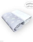 Folded baby blanket with leaf pattern on a white background, branded 'Mother's Choice'.