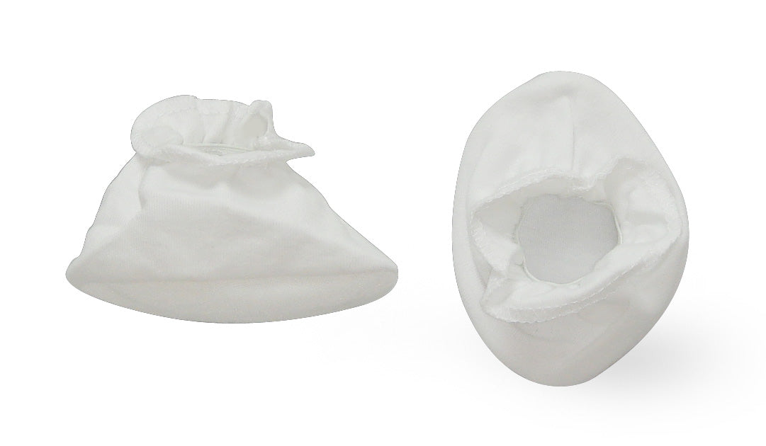 Two white baby booties on a white background