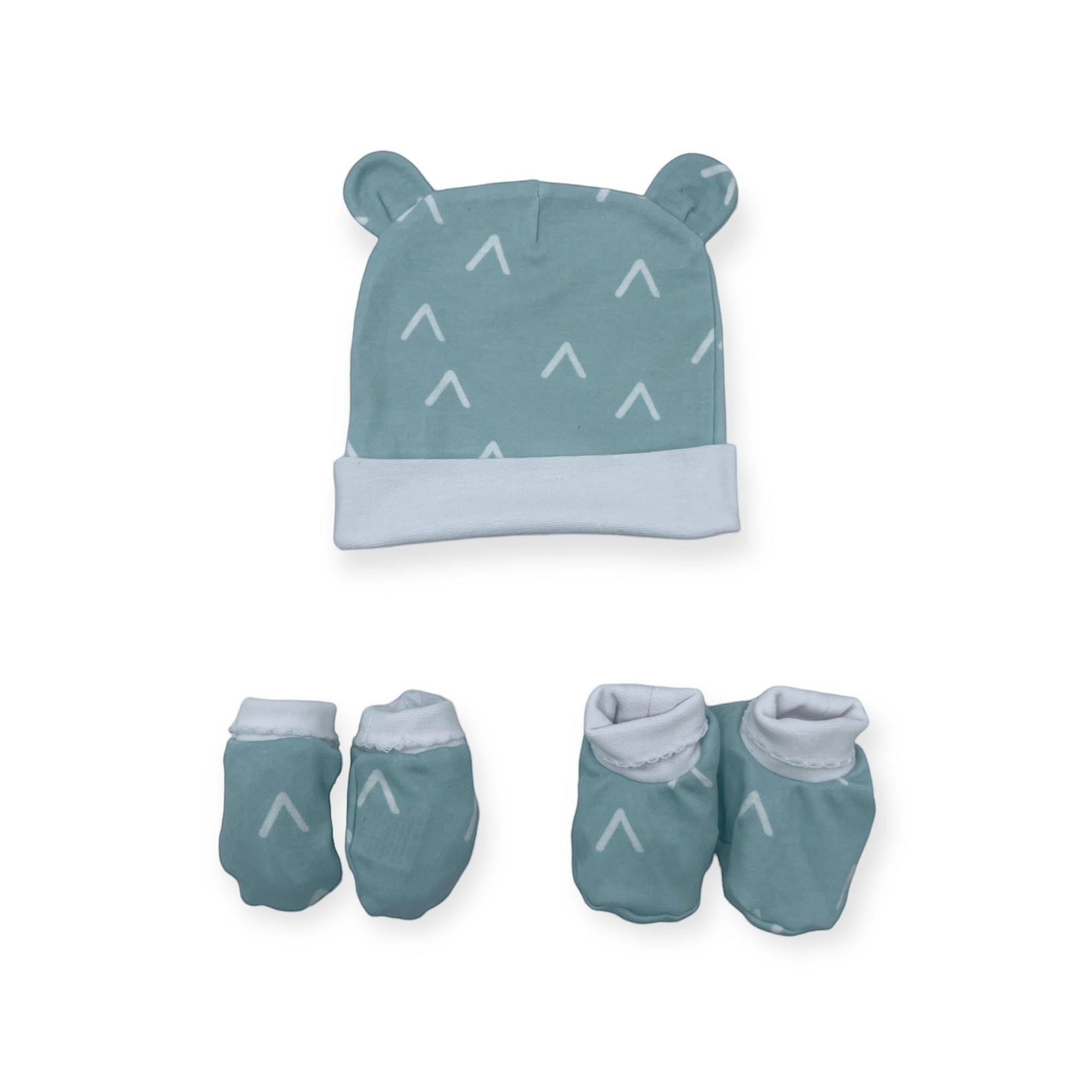 Baby hat and booties set with geometric pattern on a white background