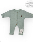 Green baby romper with buttons on a white background, featuring 'mother's choice' branding.