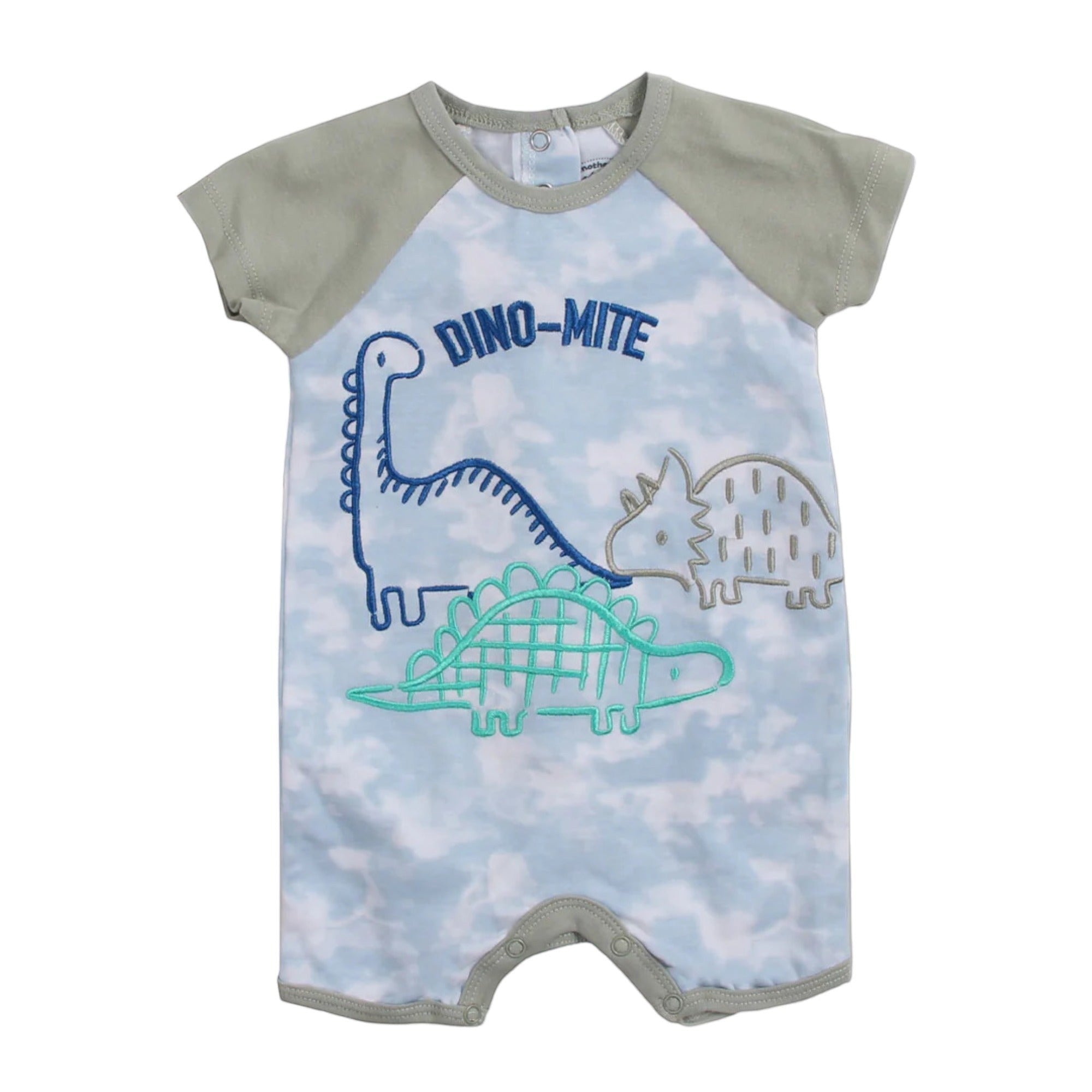 Baby romper with dinosaur design and 'DINO-MITE' text on a blue sky background