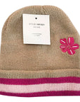 Beige knit beanie with pink flower design and striped band on a white background
