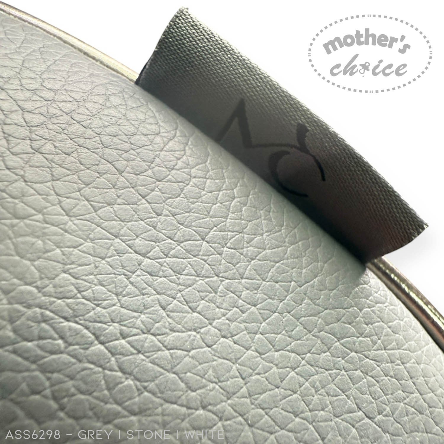 Close-up of a car headrest cover with 'mother's choice' branding on a light gray background.