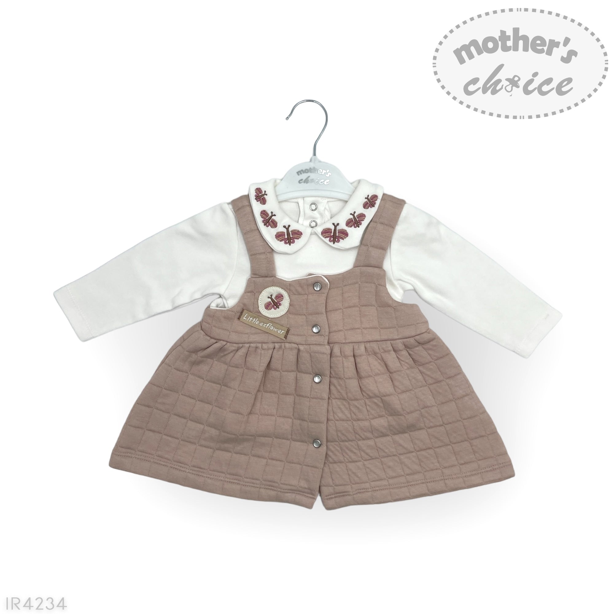 Baby outfit with brown quilted dress and white shirt on a hanger, branded 'Mother's Choice'.