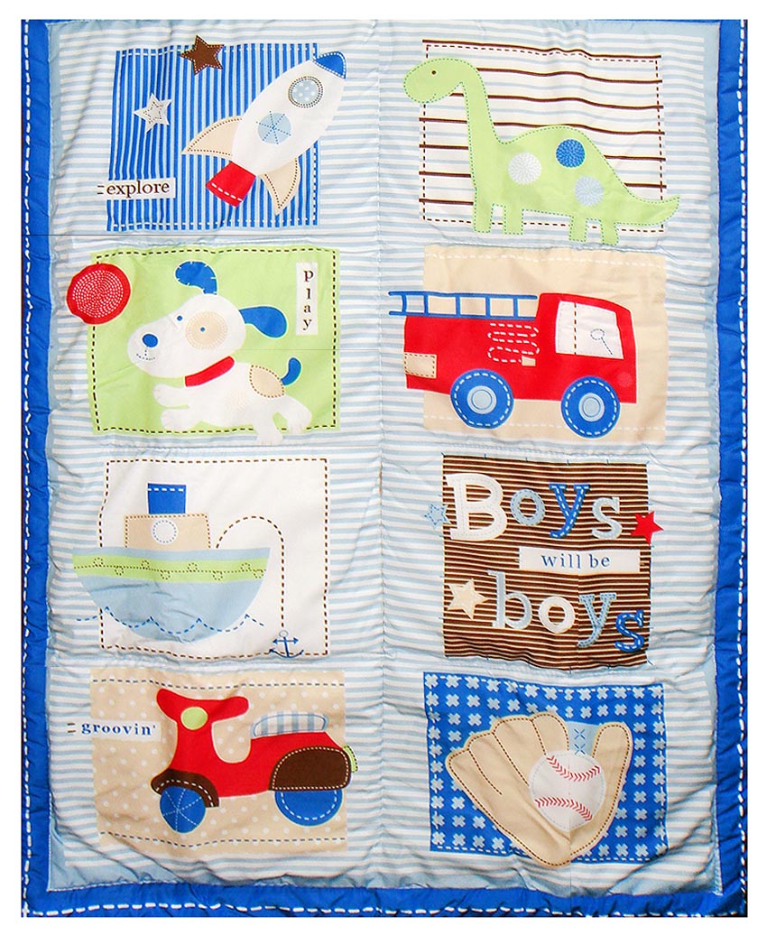 Children's educational quilt with various toys and animals on a white background