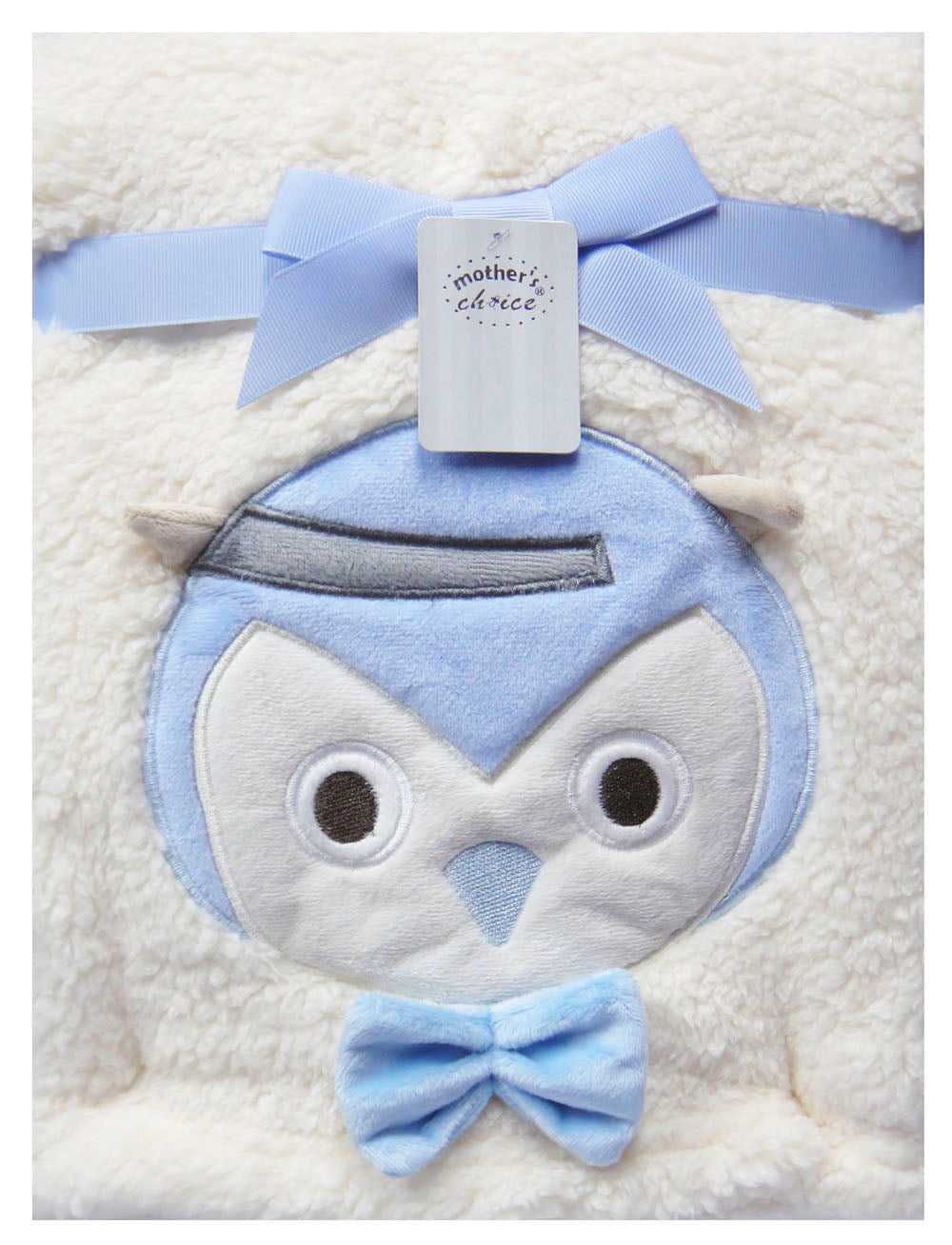 Baby blanket with penguin design and 'Mother's Choice' tag on a white background