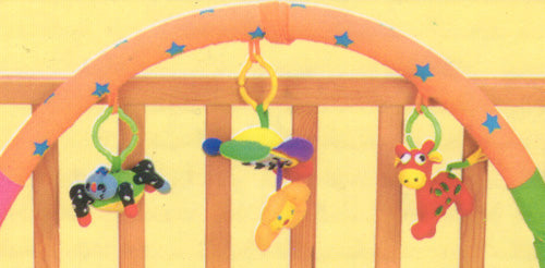 Baby play gym with colorful hanging toys on a yellow background