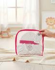 Stork And Baby white 100% cotton 3-piece baby set with polka dots and pink trim, includes hat and booties.