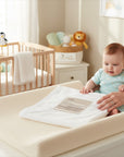 Stork And Baby white bamboo hooded towel for babies, ultra-soft and absorbent for delicate skin.