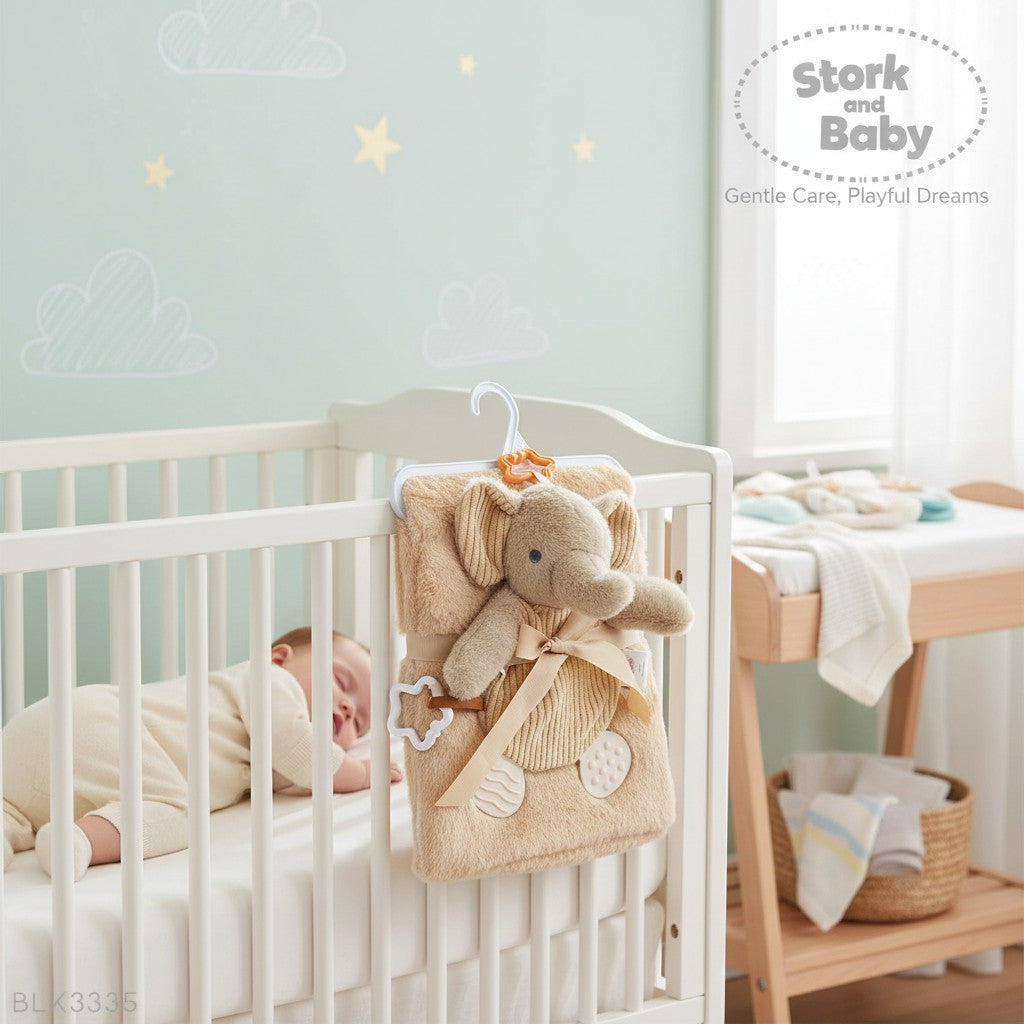 Stork and Baby beige plush blanket with elephant toy and teether, perfect for nursery.