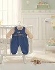 Stork And Baby blue denim dungaree set with a cream long-sleeved top, featuring train embroidery. Perfect for toddlers.