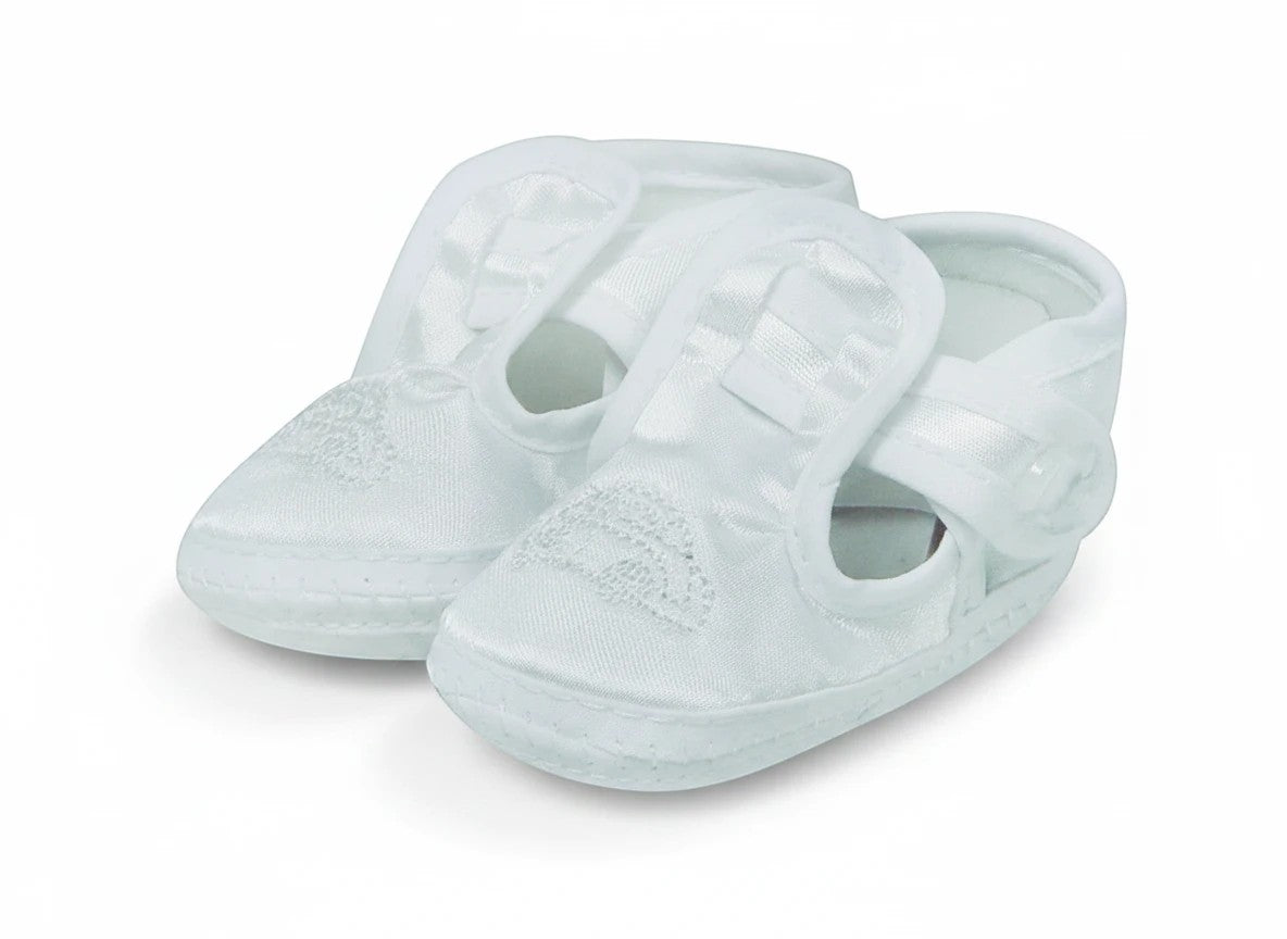 Stork And Baby white satin christening booties for boys featuring a delicate embroidered car design and velcro strap.