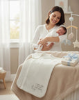 Stork And Baby Mothers Choice cotton sleeping bag with I Love You To The Moon print, shown in a cozy nursery setting.