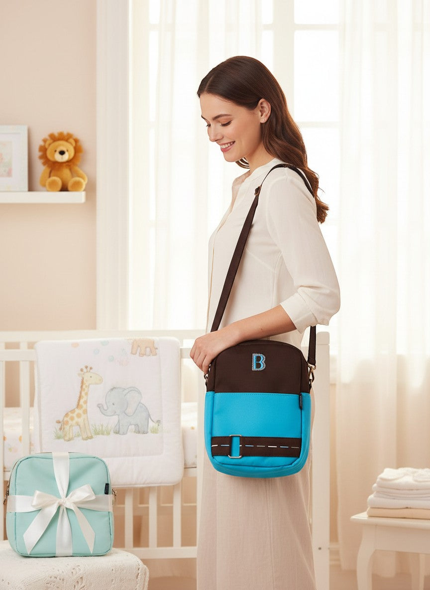 Stork And Baby brown and blue double bottle warmer bag with embroidered B, ideal for travel.