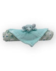 Stork And Baby blue elephant security blanket with a patterned edge.
