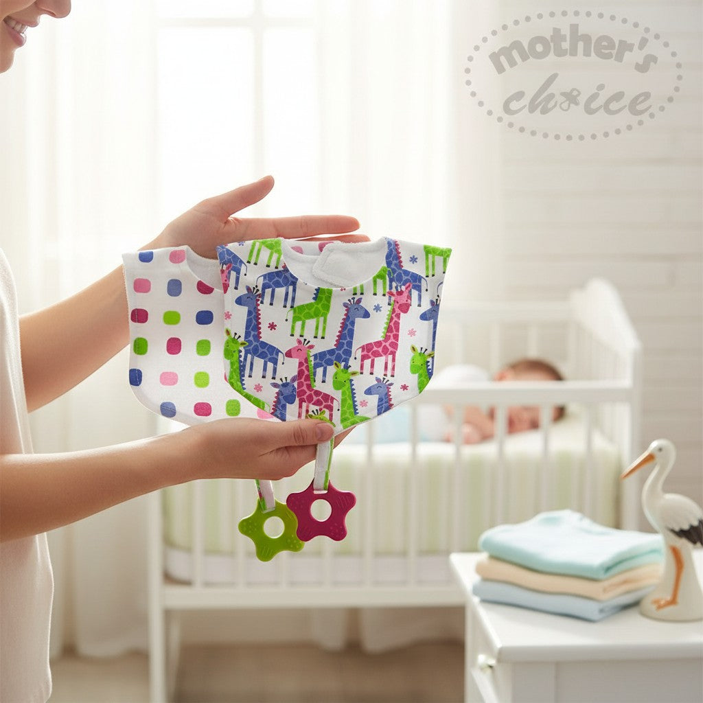 Stork And Baby Mothers Choice 2 pack bandana bibs with giraffe print and attached teethers. One bib has pink and blue polka dots.