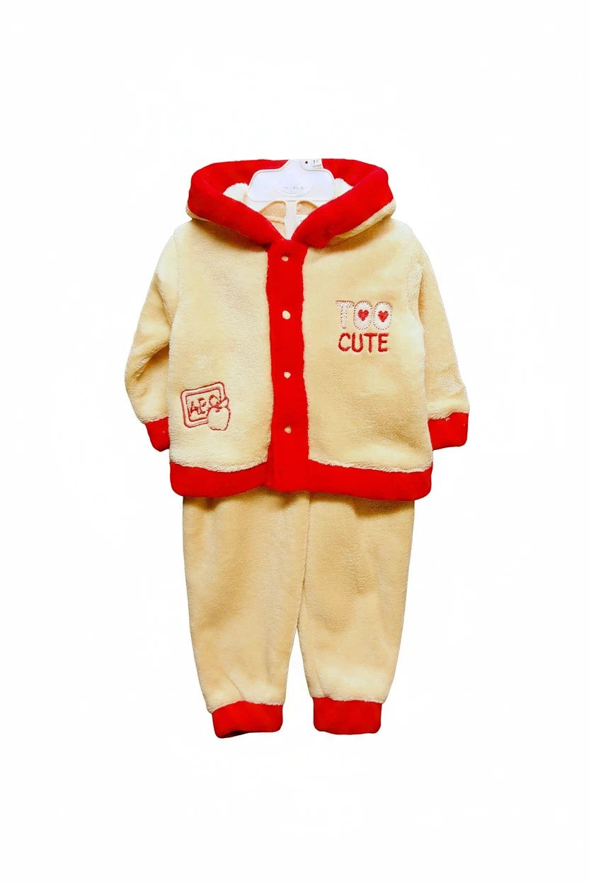 Stork And Baby girls cream coral fleece tracksuit with red trim and "Too Cute" embroidery. Hooded, button-up top and matching pants.