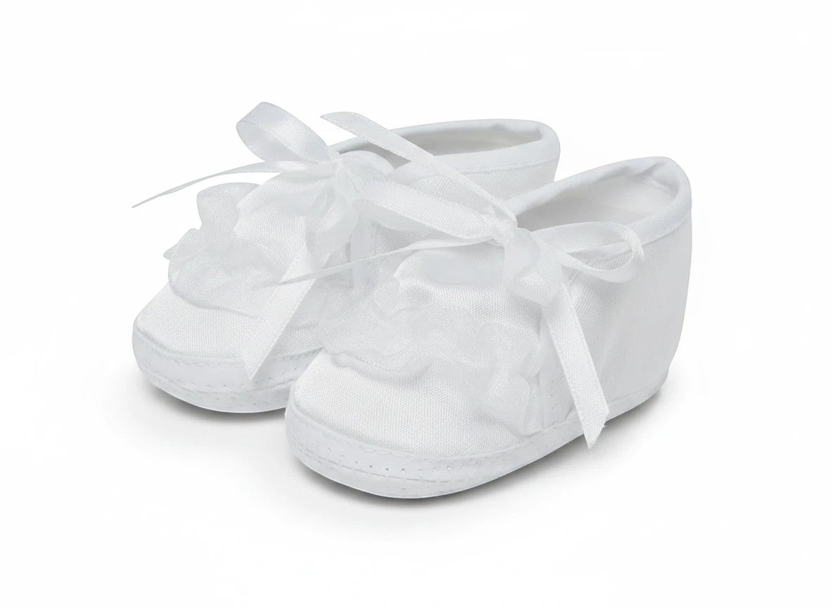 Stork And Baby Mothers Choice white christening booties for girls with delicate lace trim and satin ribbon ties.