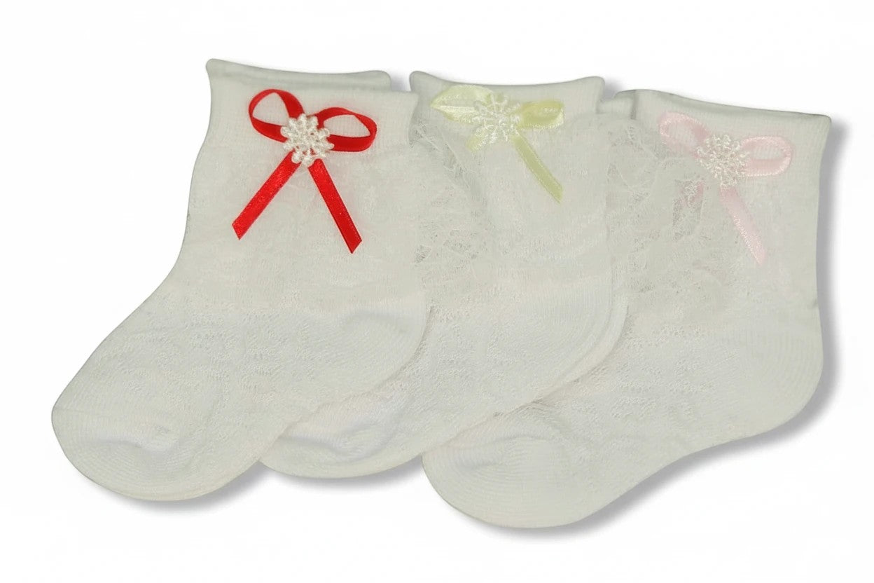 Stork And Baby Mothers Choice white lace ankle socks for girls featuring decorative red, yellow, and pink bows.