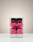 Stork And Baby girls 2-pack pink socks with floral pattern and ruffled trim, gift boxed.