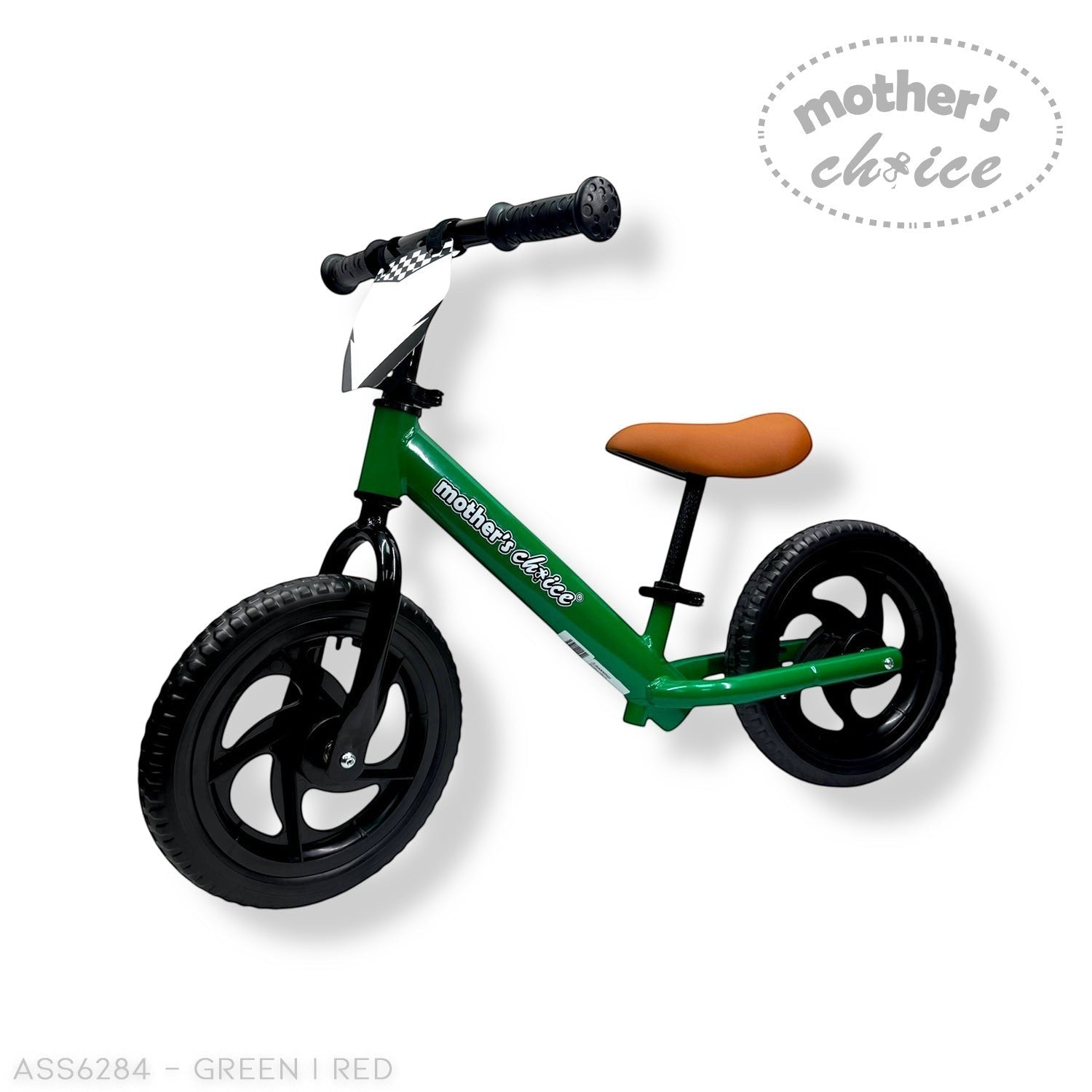 Stork And Baby green toddler balance bike with black wheels and a brown seat. Features a checkered flag detail.