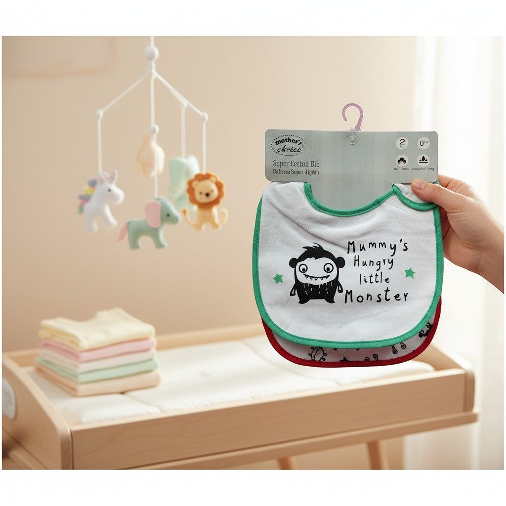 Stork And Baby Infant's 2 pack bibs with a hungry monster design and green trim. Cotton material.