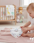 Stork And Baby infant hair accessory set featuring white heart-shaped clips and headband with black polka dot pattern.