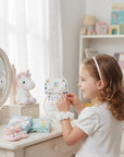 Stork And Baby infant girls hair accessory set featuring white flower clips and gold dot accents on a display card.