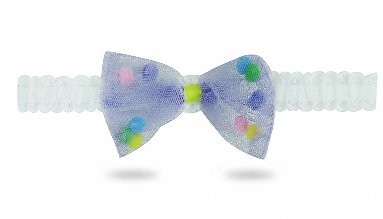 Stork And Baby Mother's Choice infant headband with a purple tulle bow featuring colorful pom-poms on a white lace band