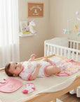 Stork And Baby Infants 5 Piece Starter Pack - Tweet Heart: white bodysuit with pink trim, floral print, and bib. Soft cotton.