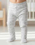 Stork And Baby light grey baby leggings with closed feet and a cute all-over animal print pattern.