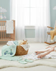 Stork And Baby 5 piece starter pack with mint scooter design, 100% cotton interlock, includes bib, onesie, and socks.