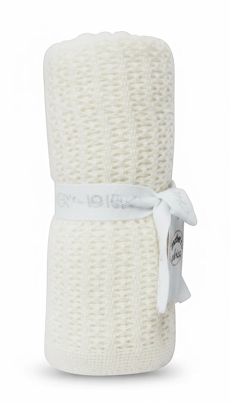 Stork And Baby Mothers Choice 100% cotton cellular baby blanket in ecru with a breathable woven texture.