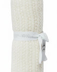 Stork And Baby Mothers Choice 100% cotton cellular baby blanket in ecru with a breathable woven texture.