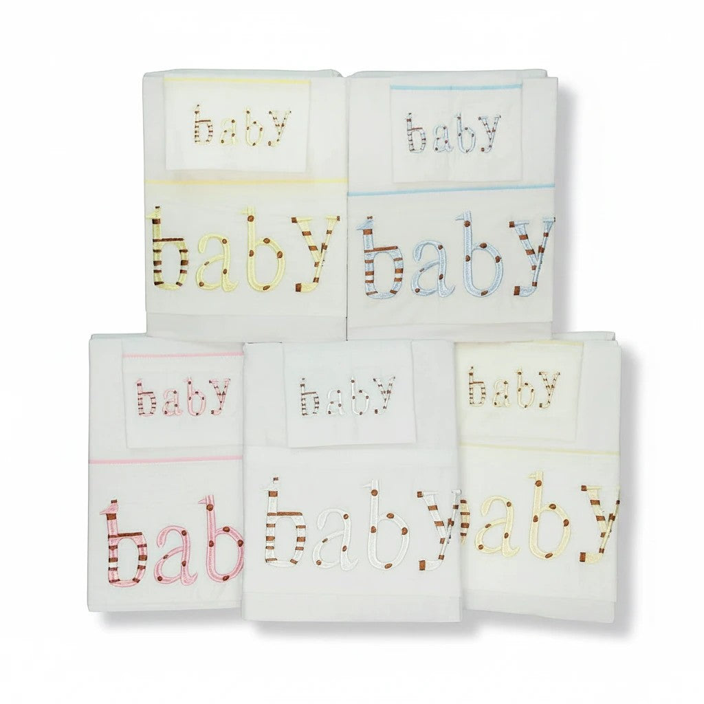 Stork And Baby Mothers Choice 3 piece cot sheet set in white with colourful embroidered baby text and giraffe motifs.