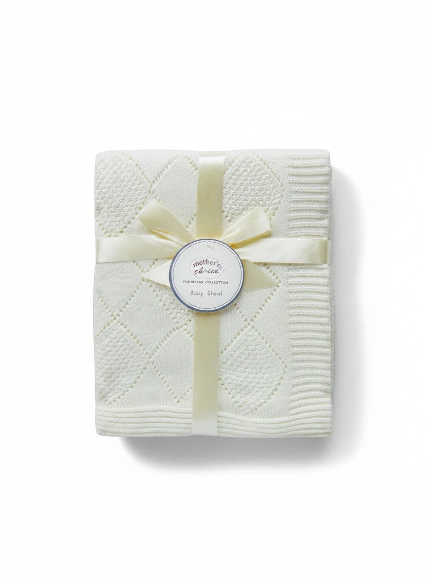 Stork And Baby Mothers Choice 100% cotton beige baby shawl with a diamond knit pattern, tied with a satin ribbon.