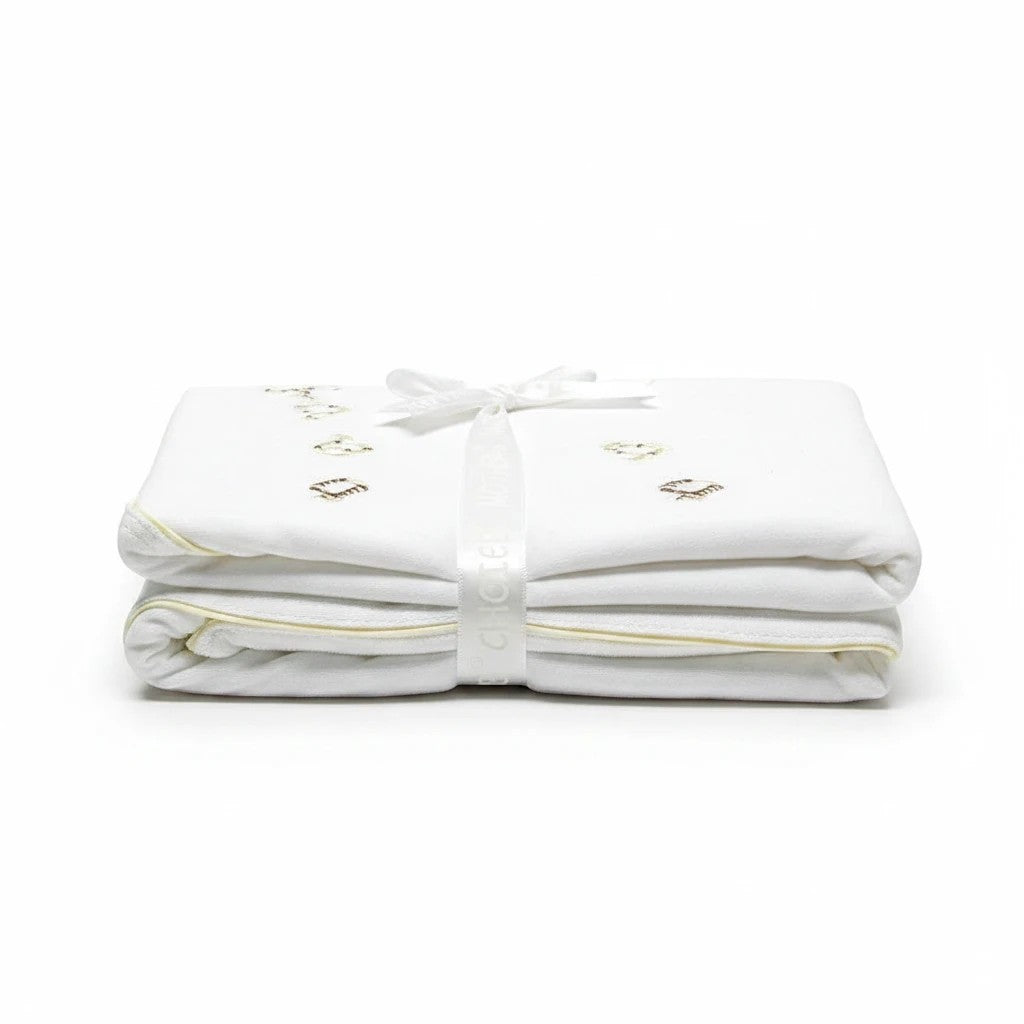 Stork And Baby Mothers Choice beige cotton jersey baby wrap with delicate embroidery, tied with a white ribbon.