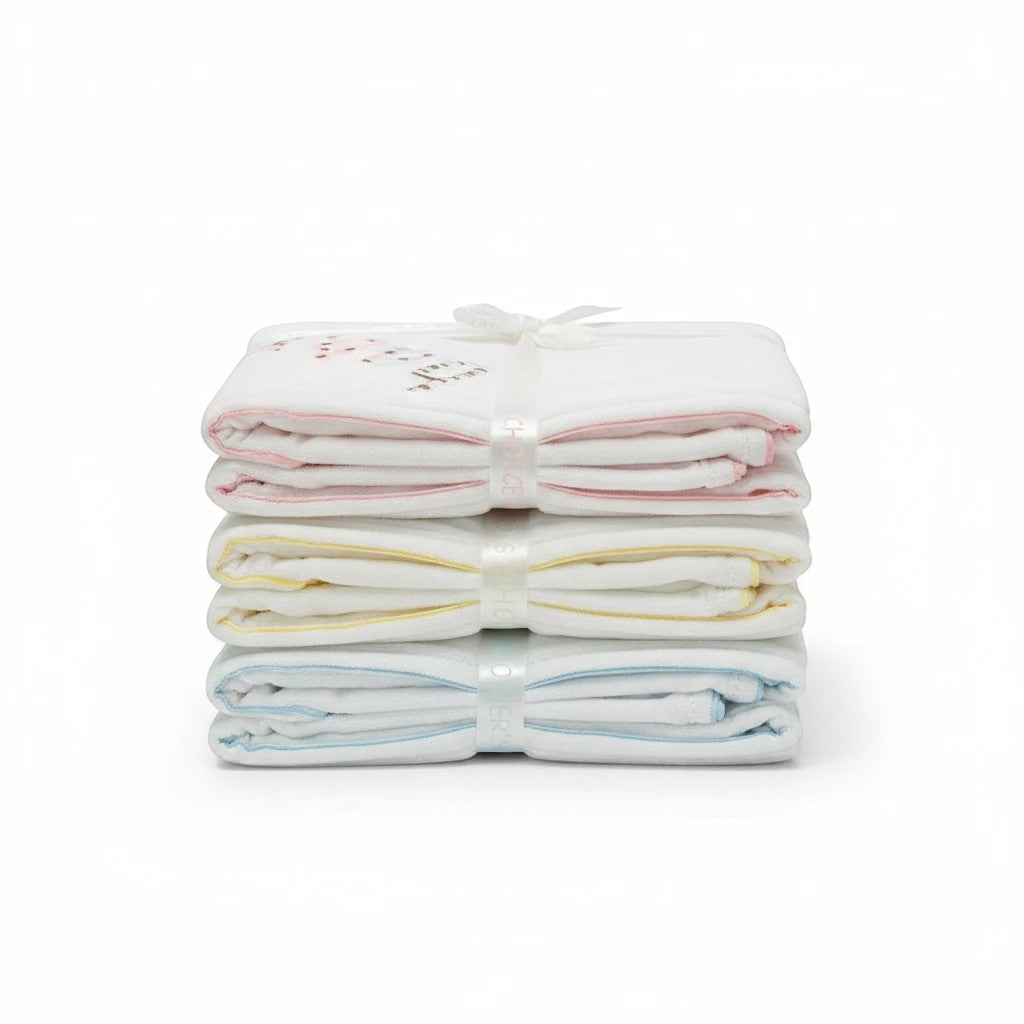 Stork And Baby Mothers Choice 100% cotton jersey baby wraps in white with pink, yellow, and blue trim, stacked.