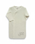 Stork And Baby Mothers Choice cotton baby sleeping bag in cream with moon print and side snap closure for easy access.