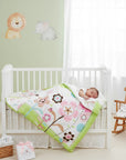 Stork And Baby Mothers Choice floral baby quilt in pink and green, covering a sleeping baby in a white wooden cot.