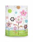 Stork And Baby Mothers Choice baby quilt featuring a white background with colorful floral and polka dot patterns.