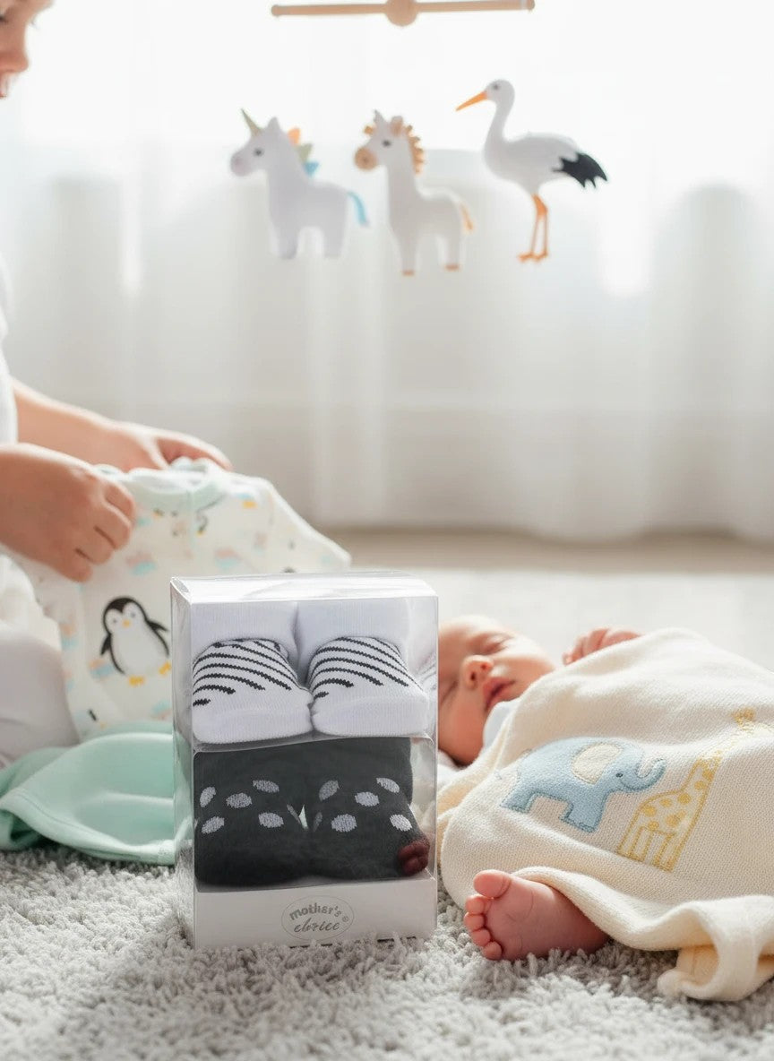 Stork And Baby Mothers Choice Girls 2 Pack Socks Gift Pack, white with black stripes and black with white polka dots.
