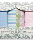 Stork And Baby Mothers Choice 3 pack cotton muslin wraps in assorted blue, pink, and green polka dot and stripe prints.